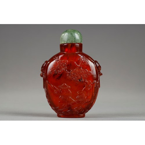 Amber snuff bottle with carved decoration of a fisherman on one side and on the other of a boatman china circa 1790/1850